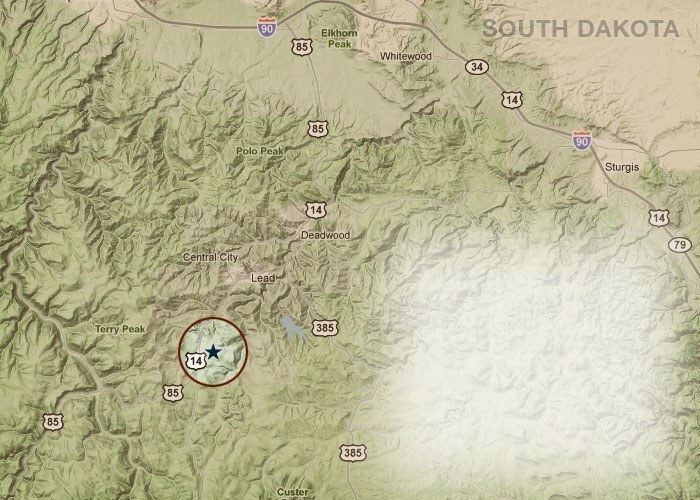 A topographic map of South Dakota with a star over Powder House Pass